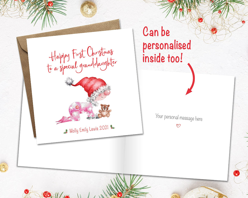 Special granddaughter card with cartoon of a pink baby in a santa hat. The card is printed with a personal message inside and the baby name on the front