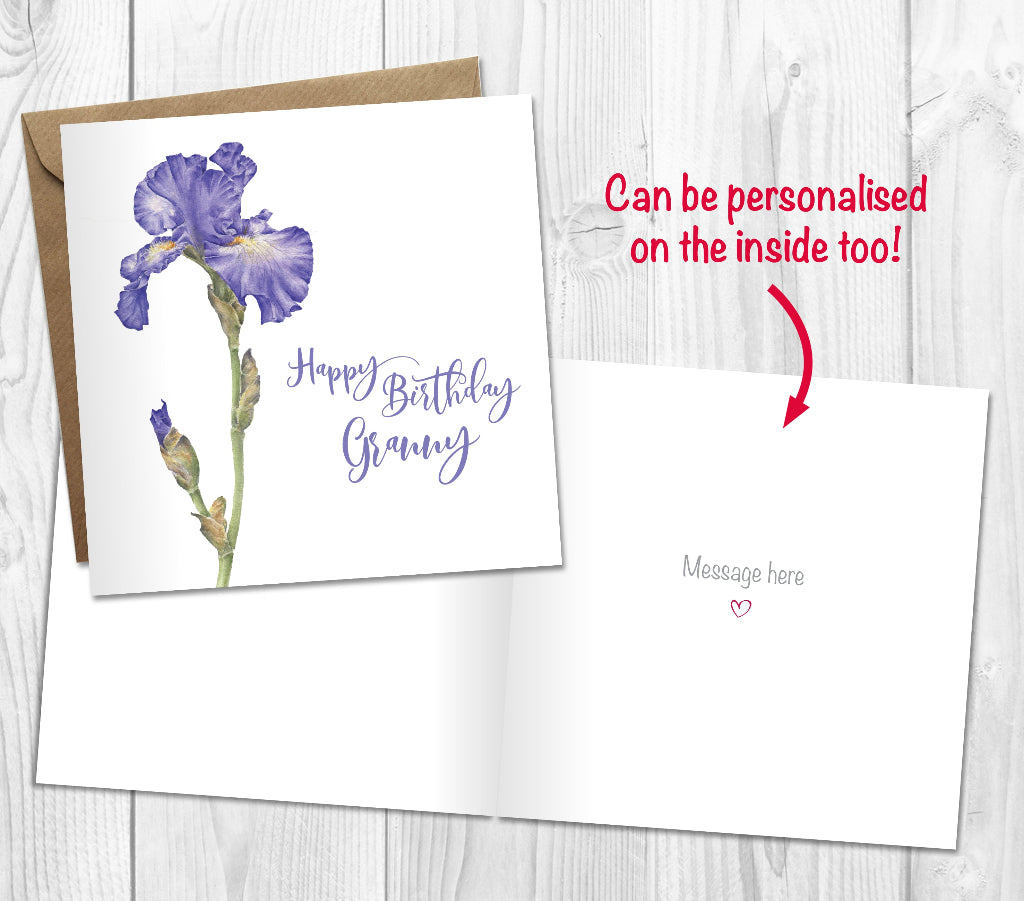 Personalised birthday card with pretty purple iris illustration and 'Happy Birthday Granny' text on a wooden surface. Can be personalised with custom message printed inside the card too.