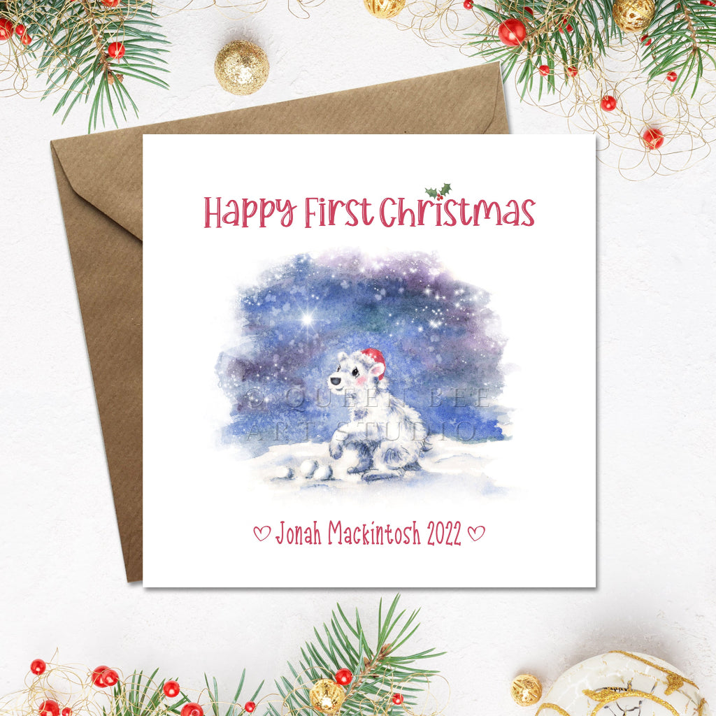 Christmas card with a baby polar bear and 'Happy First Christmas' text, personalised with name and year along bottom