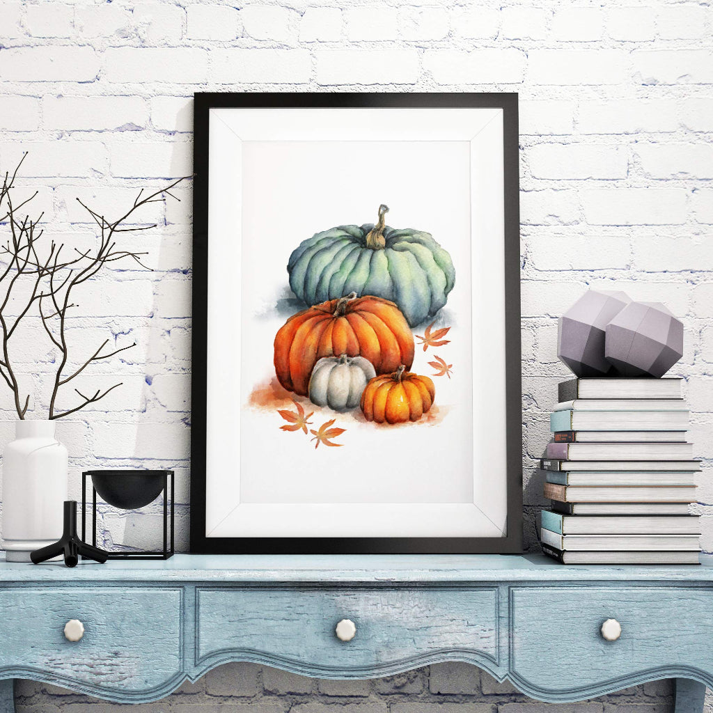 large framed picture of naive style halloween pumpkins in orange and blue in rustic farmhouse room setting