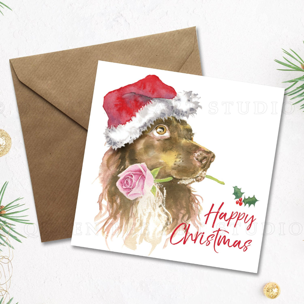 Large square christmas card with watercolour painting of a beautiful working cocker spaniel on the front