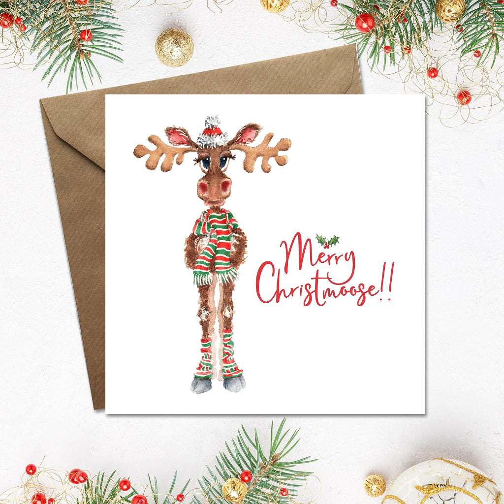 Square merry christmas card with cute painting of a funny reindeer or moose in hat, scarf and legwarmers