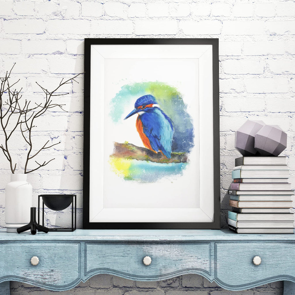 large framed picture of a bright blue, turquoise and orange kingfisher sitting on a branch in a rustic country style room