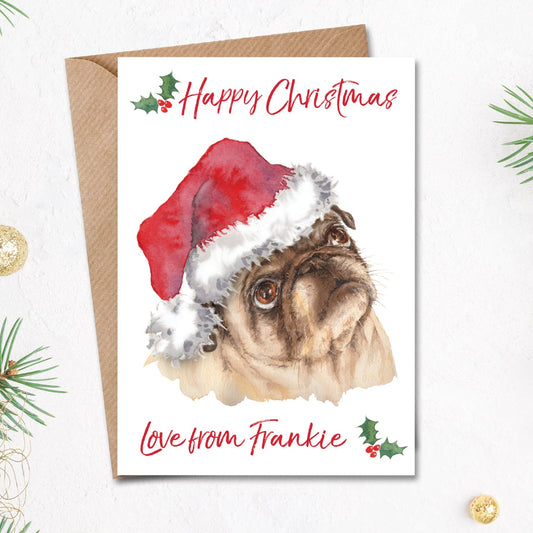 Christmas card with a cream pug in a big santa hat on the front, personalised with the dog's name