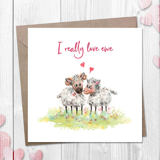 Romantic love you card with illustration of sheep on the front, with I Really Love Ewe on the front