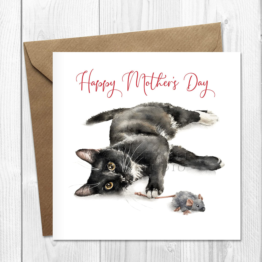 Happy Mother’s Day card featuring an illustration of a cute black and white cat playing with a toy mouse.