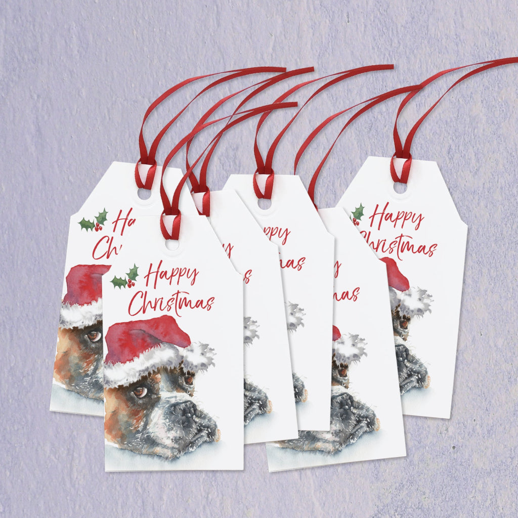 Set of Christmas gift tags with red ribbons with illustration of boxer dog in santa hat