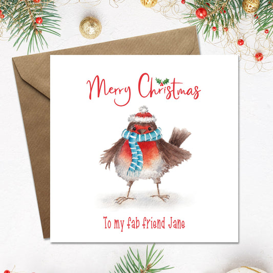 Personalised Christmas card with a cute illustration of a robin with a santa hat and striped scarf