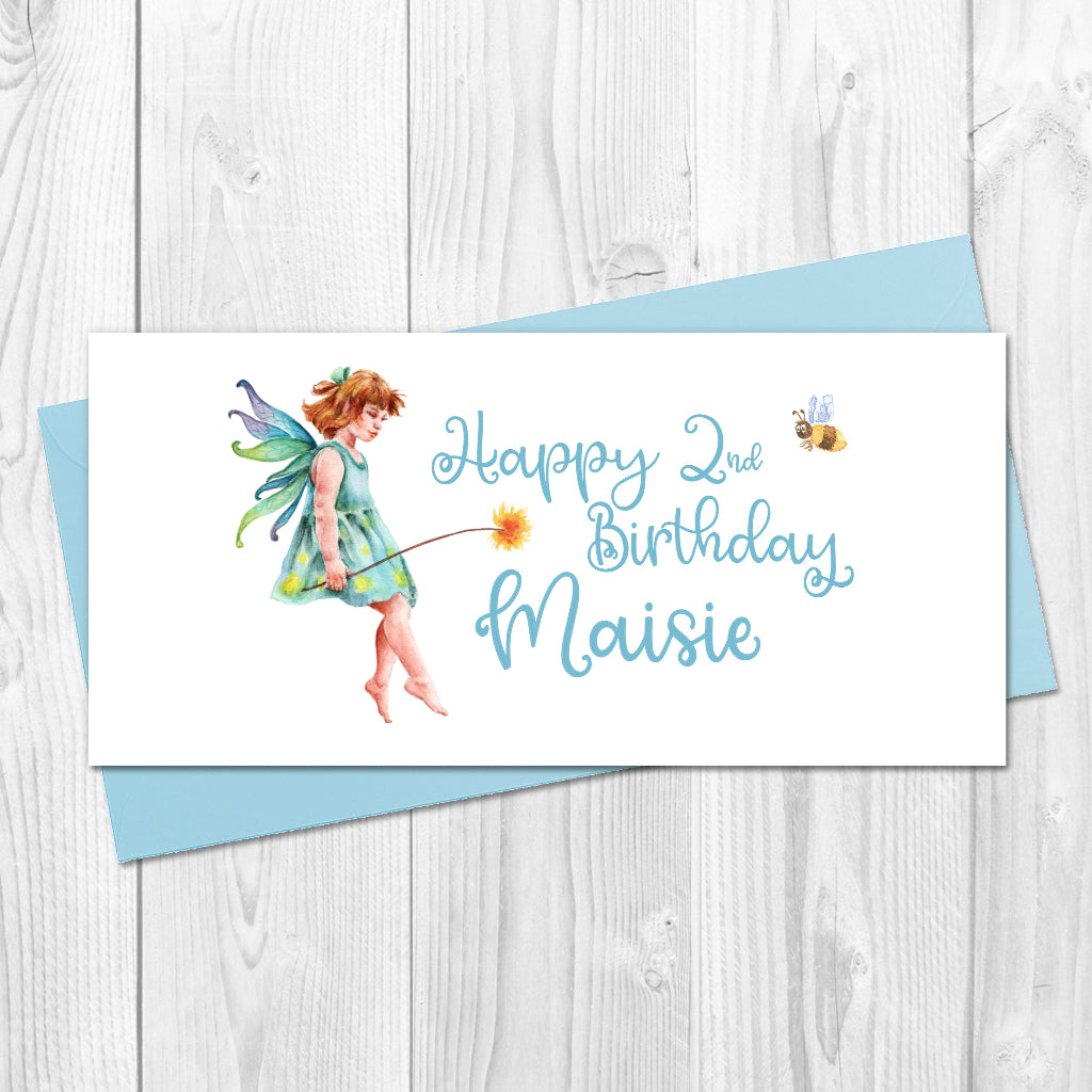 Personalised fairy birthday money wallet card front view showing turquoise fairy design and birthday name