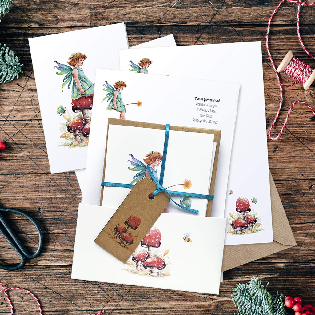 personalised fairy stationery set with fairy paper, matching cards, presentation gift wallet, ribbon and tag, ready to be wrapped up as a Christmas gift.