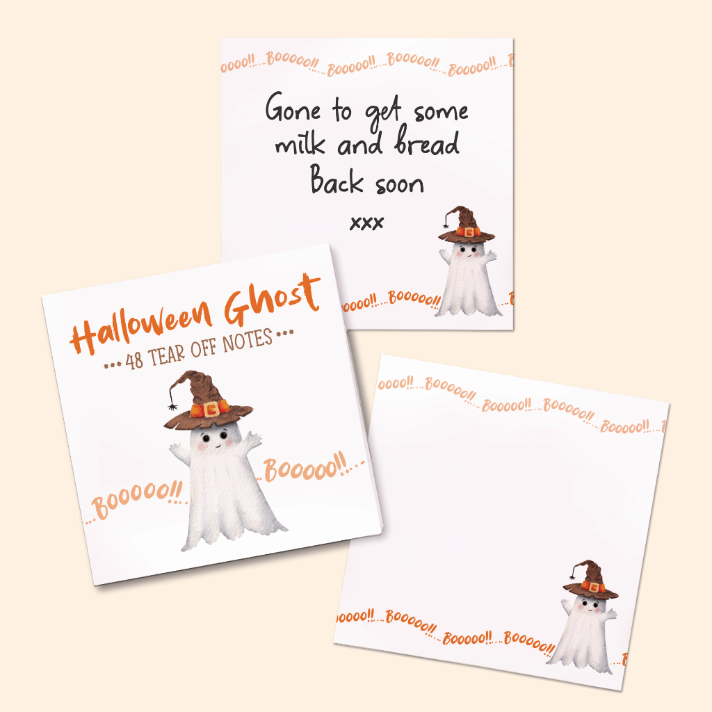 A Halloween-themed tear-off notepad with 2 notes arranged on a light beige background. Two notes feature a cartoon ghost wearing an orange witch hat with the text 'Boo', showing design while the third note shows some text , demonstrating use.