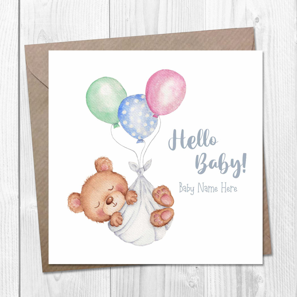 Baby shower card with a teddy bear and balloons on a white background