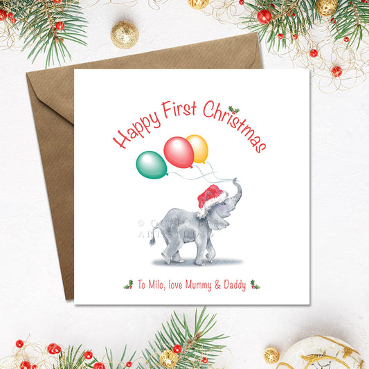 Personalised Happy 1st Christmas card with a cute baby elephant in a santa hat and balloons.