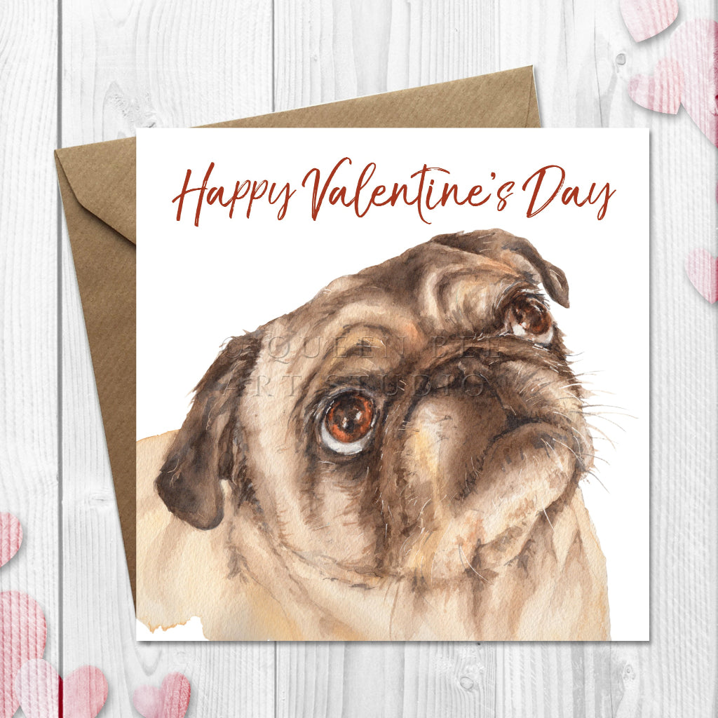 Valentine's Day card with a pug illustration and 'Happy Valentine's Day' text on a wooden surface with heart decorations.