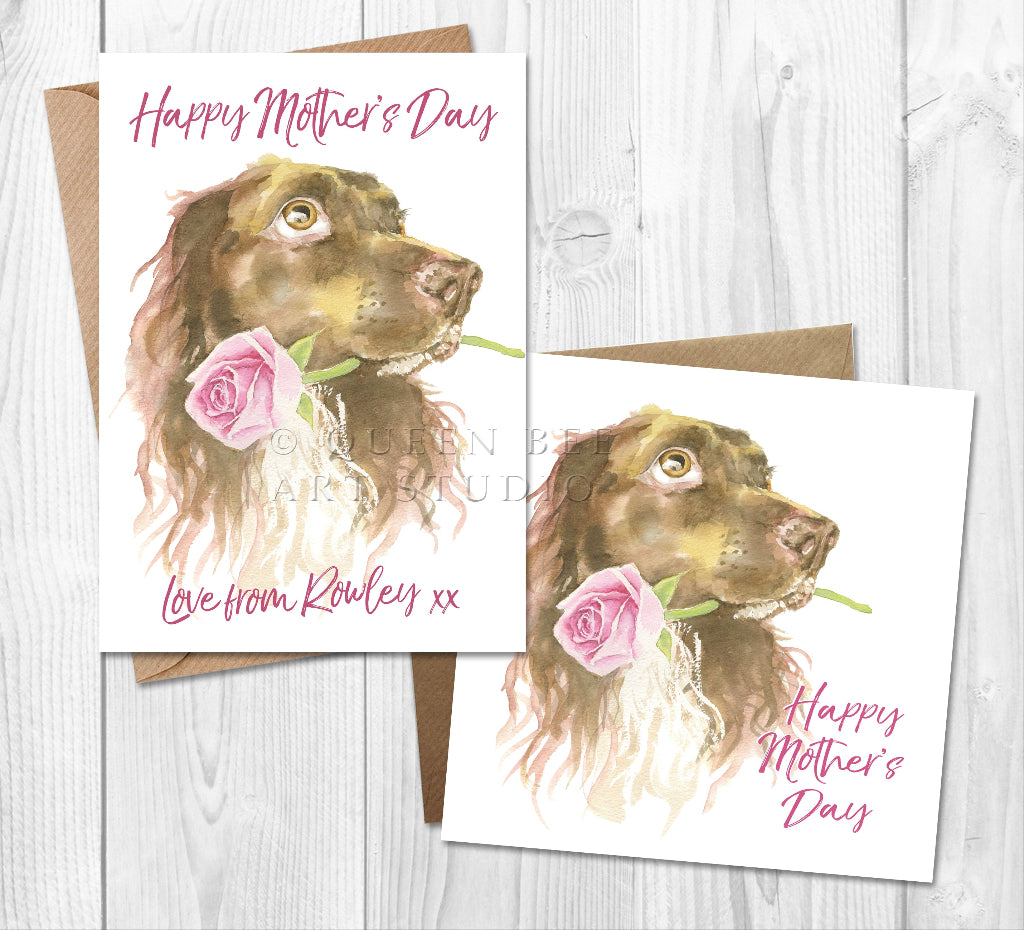 Two Mother's Day cards with a sprocker spaniel dog and rose design on a wooden surface.