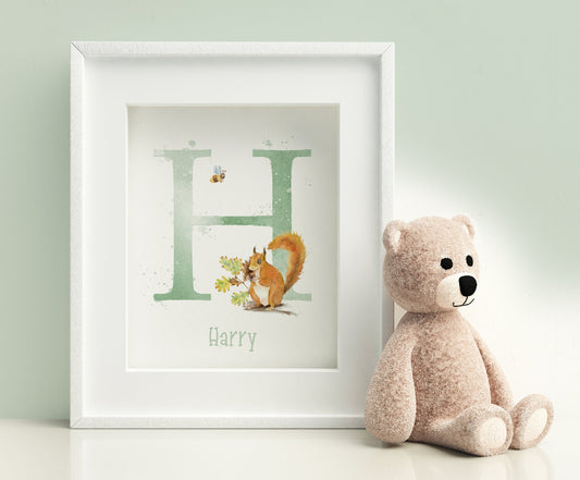 framed picture of personalised red squirrel initial print in sage green for nursery or kids bedroom