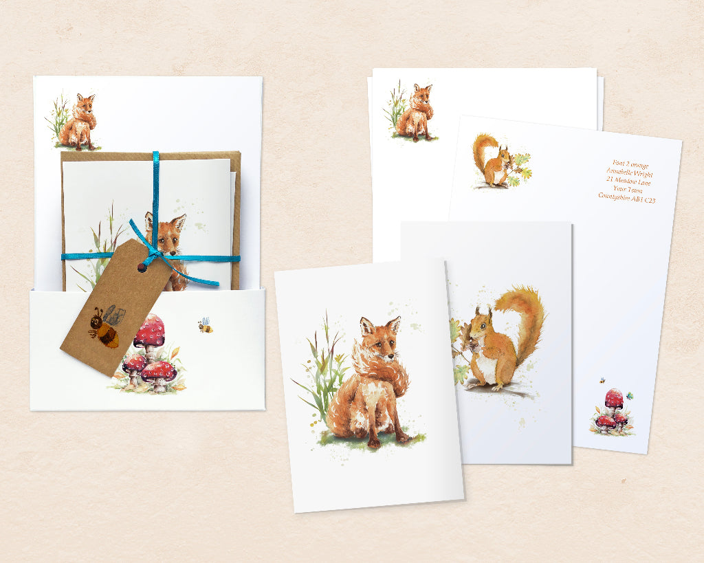 Personalised woodland animal stationery set with personalised writing paper printed with cute fox, squirrel and red fairy toadstool, matching fox and squirrel notelets, and presentation gift waller.
