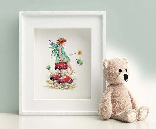 small framed picture of pretty tiny woodland fairy sitting on a toadstool